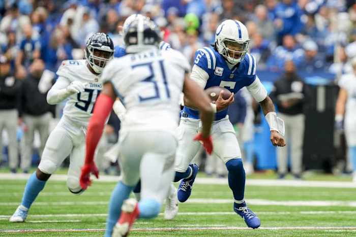 Indianapolis Colts quarterback Anthony Richardson (5) looks to run with the ball Sunday, Oct. 8, 2023, during a game against the Tennessee Titans at Lucas Oil Stadium in Indianapolis.